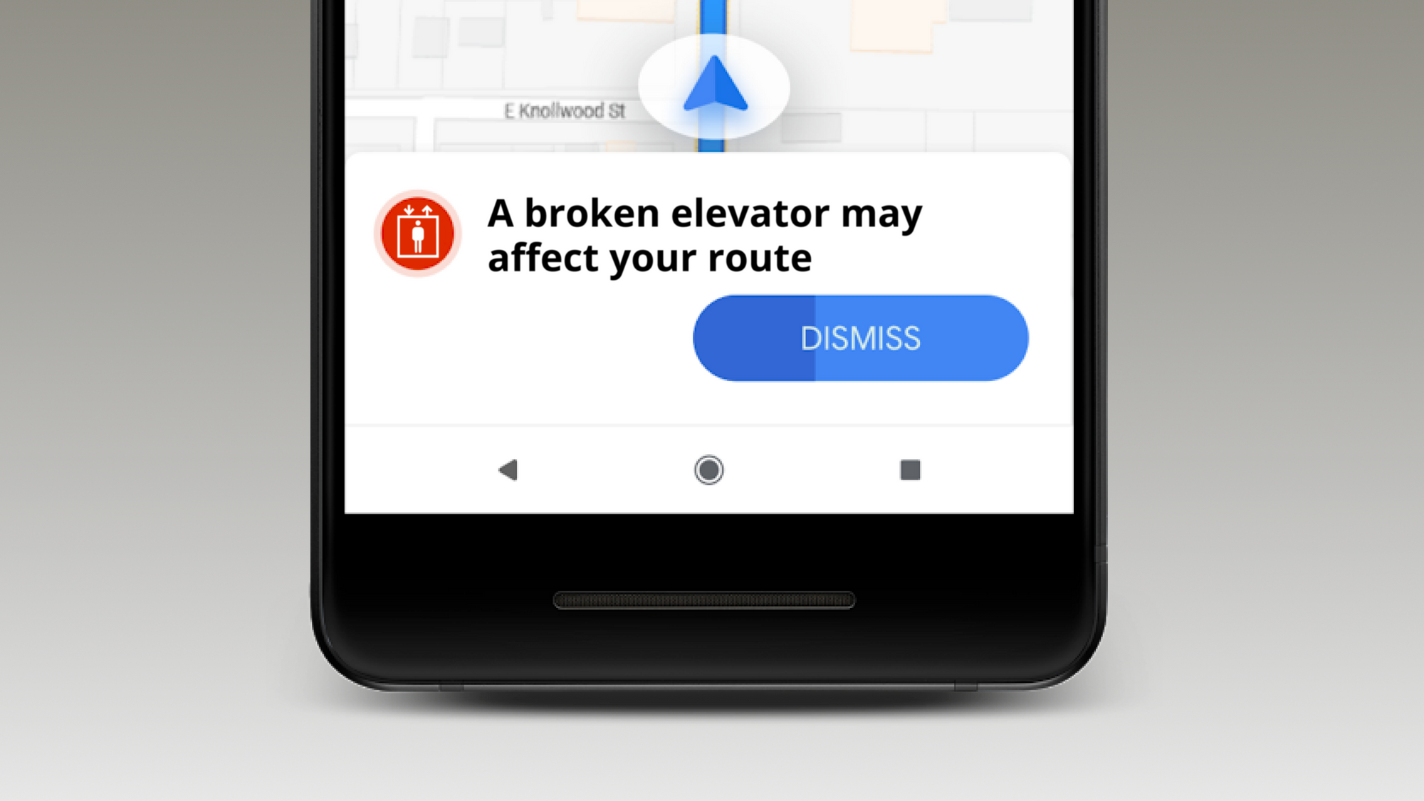 Google Maps showing a notification with a red elevator icon. The notification text reads: "A broken elevator may affect your route."